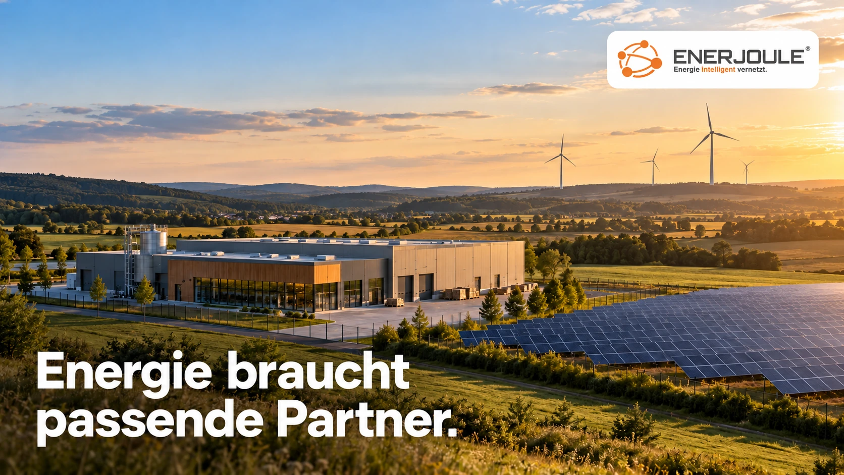 Fiktive Landschaft mit Unternehmen, Solarpark und Windrädern, EnerJoule-Logo und der Bildüberschrift „Energie braucht passende Partner.“